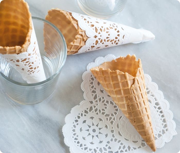 waffle cones wrapped with paper doilies ... simple and sweet! 