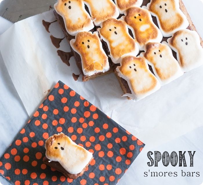 spooky s'mores bars ... a thick cookie crust topped with milk chocolate and ghost marshmallow peeps