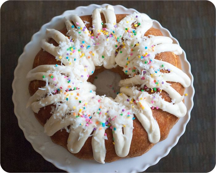 coconut cream bundt cake with cream cheese icing from @bakeat350