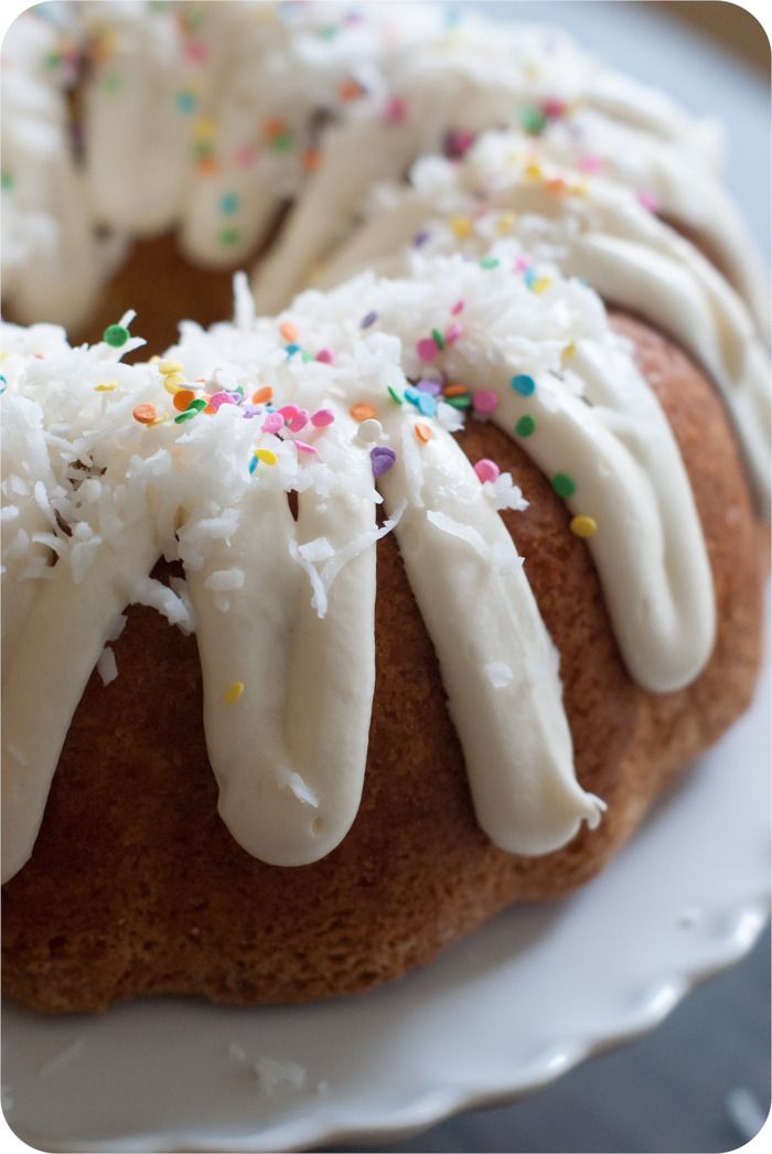 coconut cream bundt cake with cream cheese icing from @bakeat350