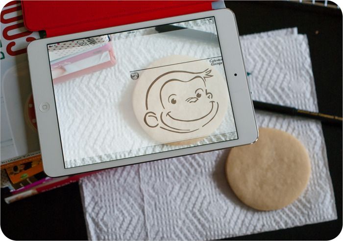 an iPad app that allows you to trace images onto cookies for decorating ... great alternative to a KopyKake