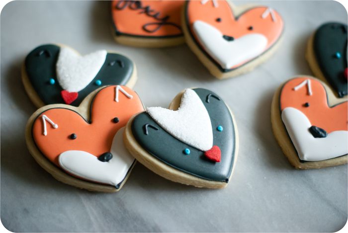 fox and skunk cookies from a heart cookie cutter, simple cookie decorating tutorials