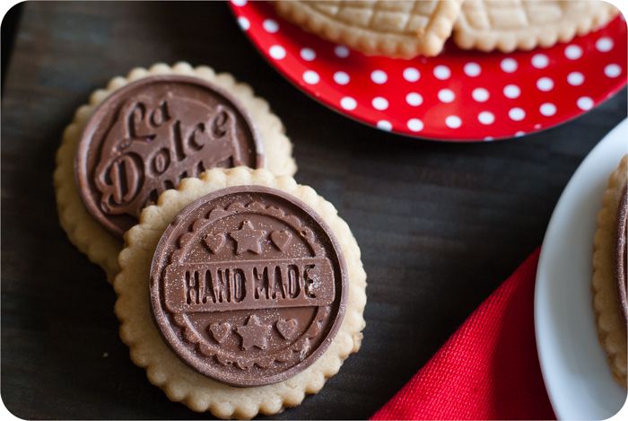 salted almond shortbread cookies with milk chocolate toppers