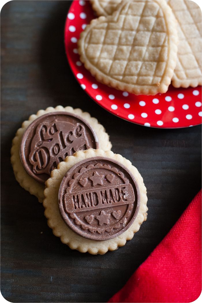 salted almond shortbread cookies with milk chocolate toppers