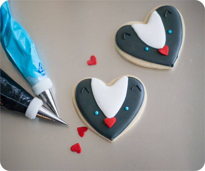 heart-shaped skunk cookies ... you're too stinkin' cute!  {valentine decorated cookie tutorial}