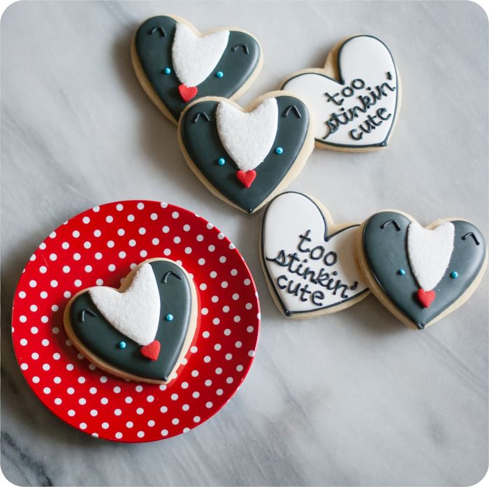 heart-shaped skunk cookies ... you're too stinkin' cute!  {valentine decorated cookie tutorial}