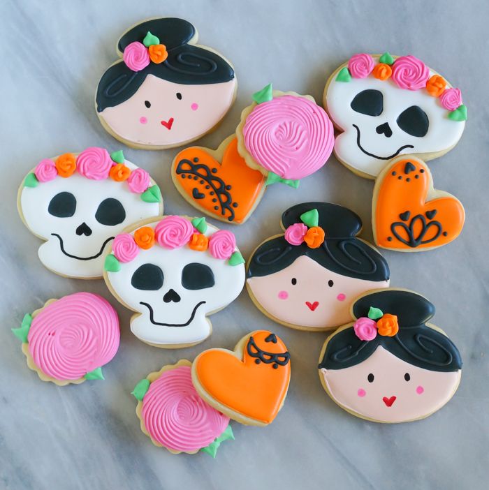 Dia de los Muertos Decorated Cookies > skeleton face with flower crown, parade girl, lace hearts, and roses ... decorating tutorial