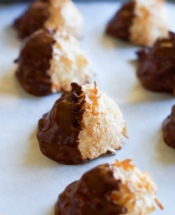 Chocolate-Dipped Coconut Macaroons ... big, chewy, fluffy cookies made with unsweetened coconut and semisweet chocolate.