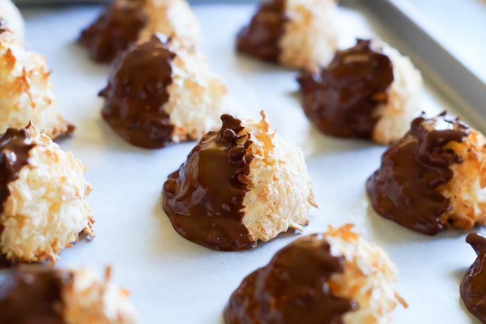 Chocolate-Dipped Coconut Macaroons ... big, chewy, fluffy cookies made with unsweetened coconut and semisweet chocolate.