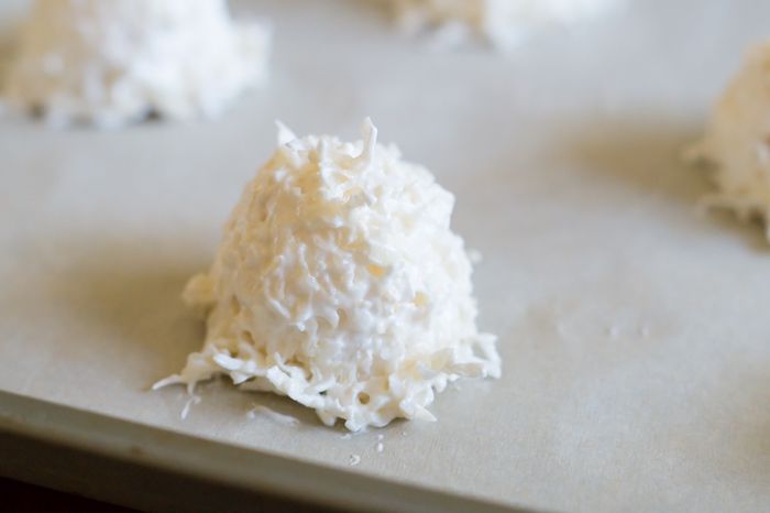 Chocolate-Dipped Coconut Macaroons ... big, chewy, fluffy cookies made with unsweetened coconut and semisweet chocolate.