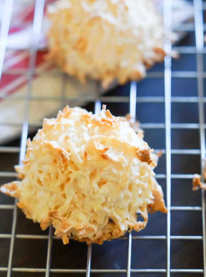 Chocolate-Dipped Coconut Macaroons ... big, chewy, fluffy cookies made with unsweetened coconut and semisweet chocolate.