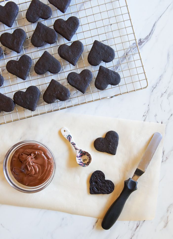 Heart-Shaped Chocolate Hazelnut Sandwich Cookies ♥ bakeat350.blogspot.com