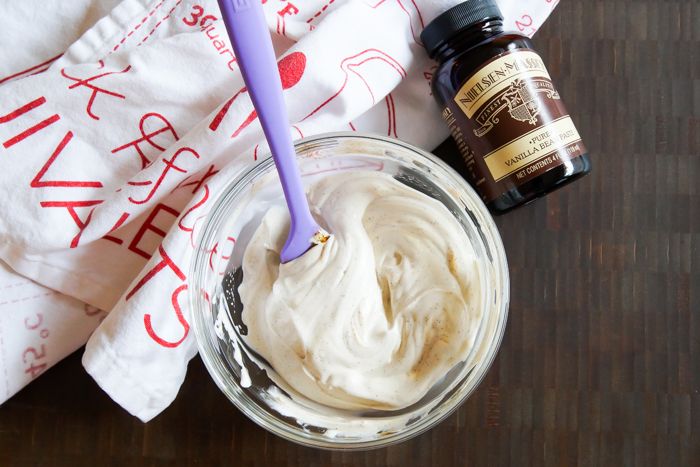 Cinnamon Roll Bundt Cake with a thick, vanilla bean-cream cheese frosting.