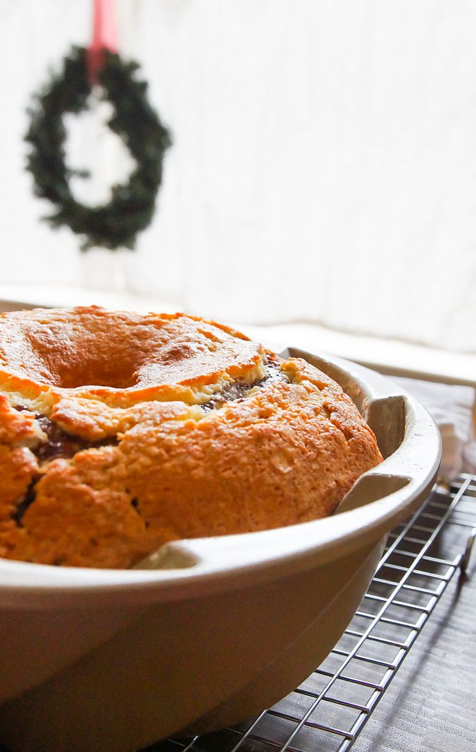 Cinnamon Roll Bundt Cake with a thick, vanilla bean-cream cheese frosting. | bakeat350.blogspot.com