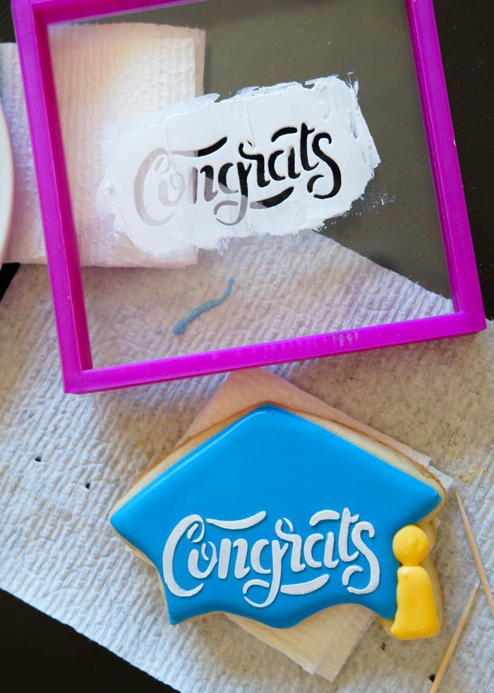how to make stenciled graduation cap cookies | bakeat350.net
