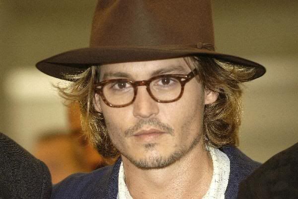 johnny depp glasses. I believe Johnny Depp wears